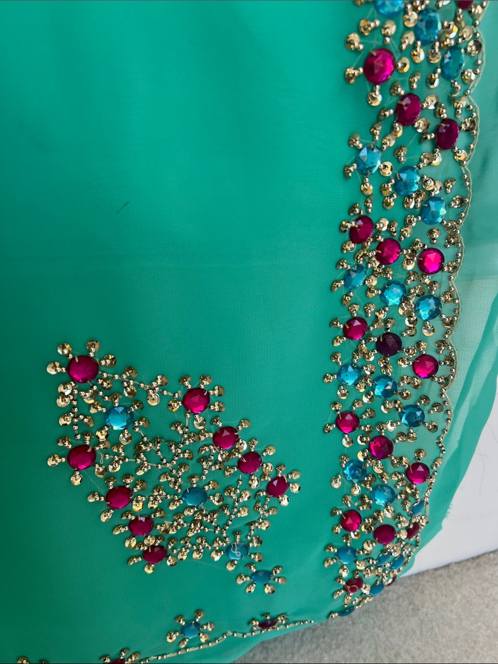 Embellished Teal Saree with Jewel Accentsu
